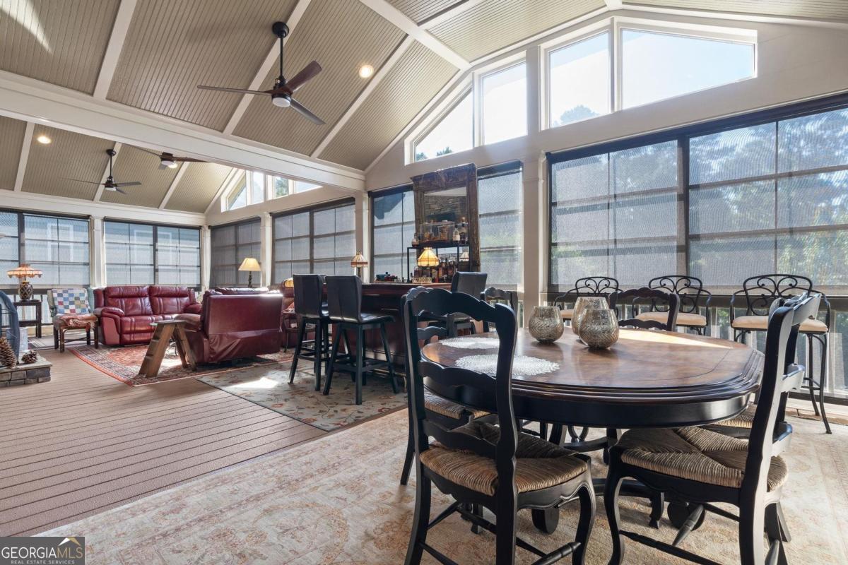 1151 Spring Station Road Greensboro, GA 30642 - Photo 36 of 60 a view of a dining room with furniture