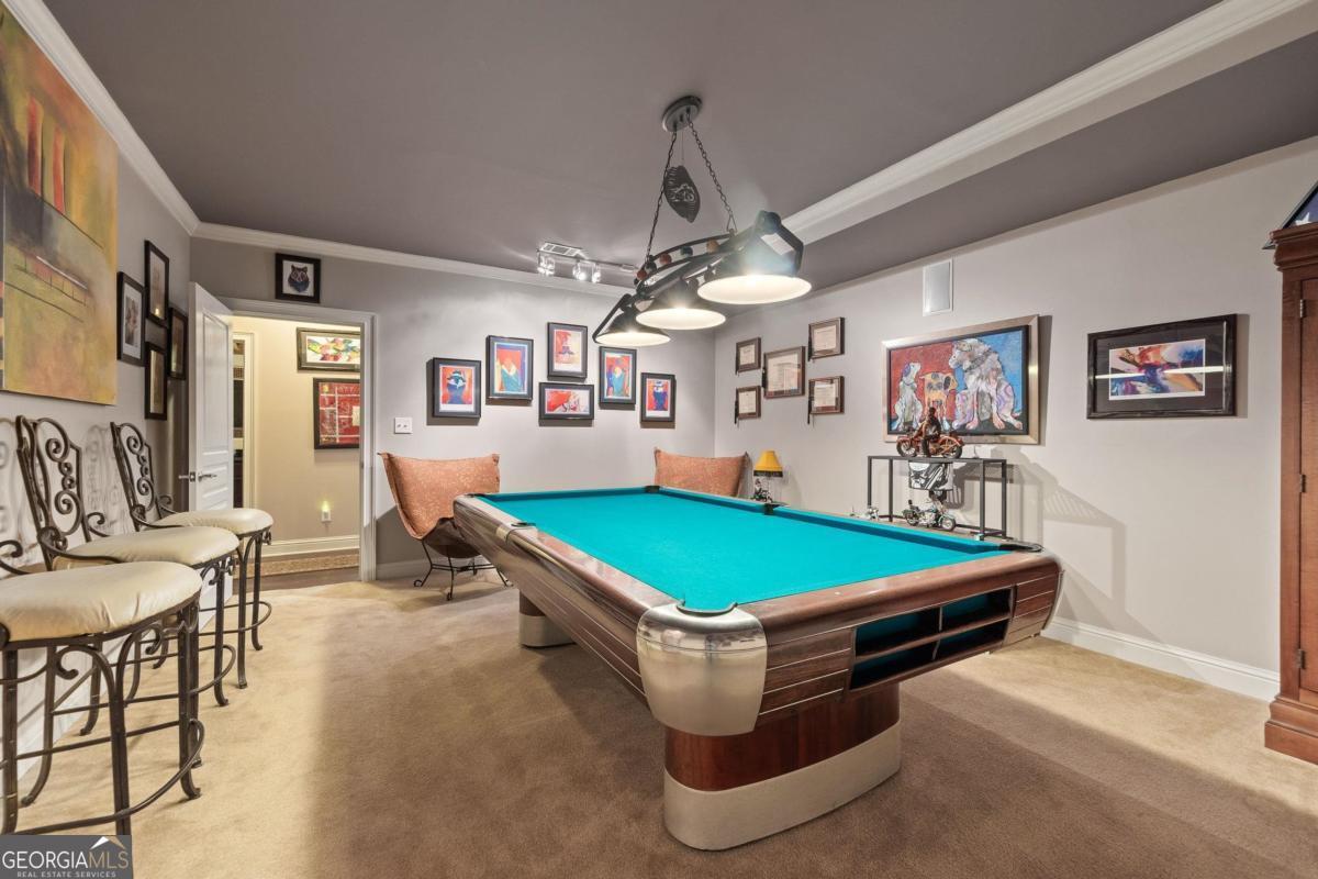 1151 Spring Station Road Greensboro, GA 30642 - Photo 40 of 60 a room with pool table and windows