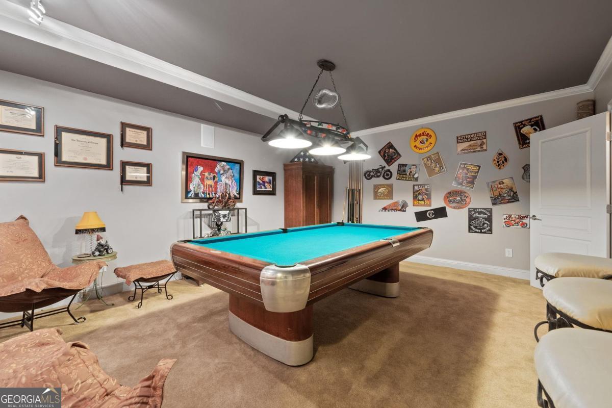 1151 Spring Station Road Greensboro, GA 30642 - Photo 41 of 60 a room with pool table and windows