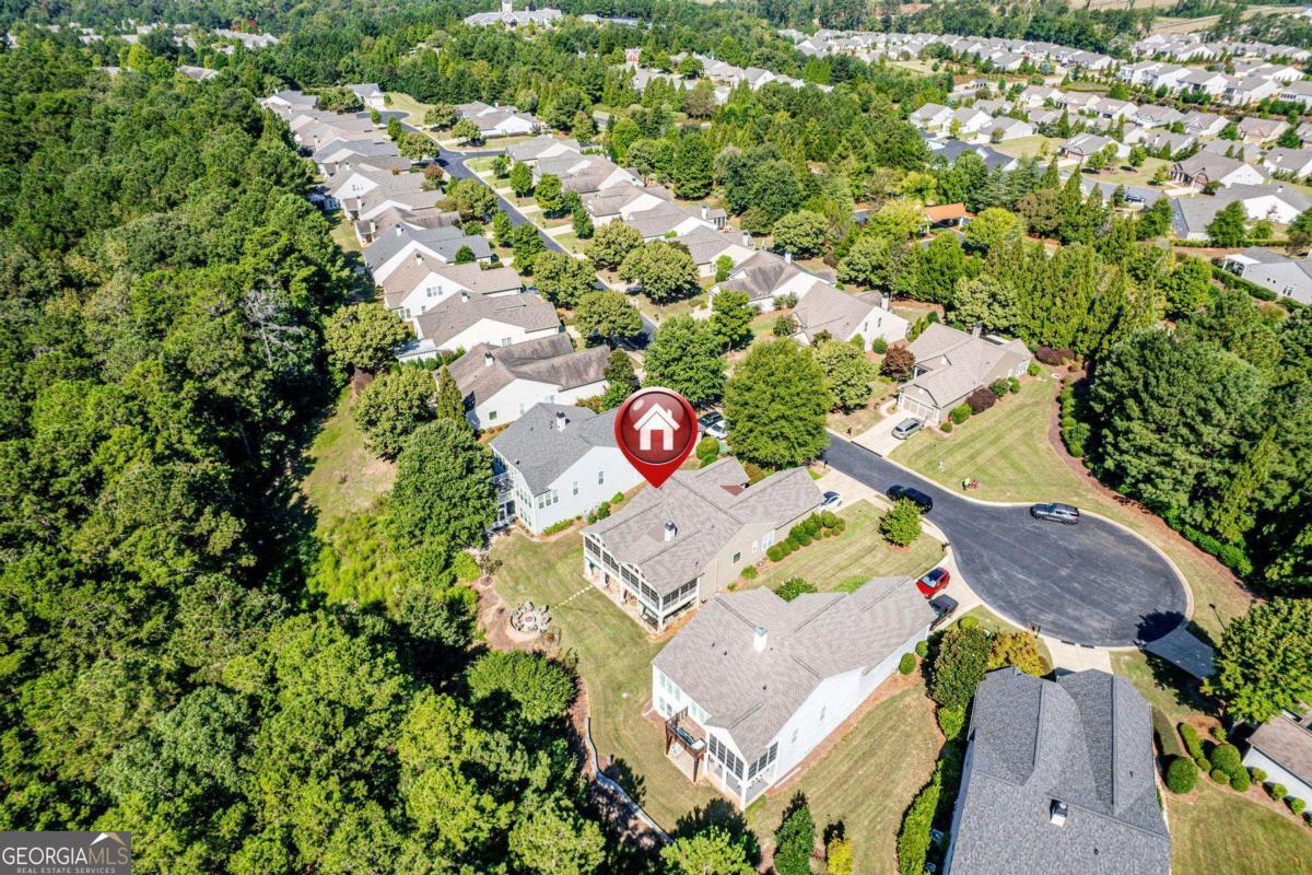1151 Spring Station Road Greensboro, GA 30642 - Photo 57 of 60 an aerial view of residential house with outdoor space