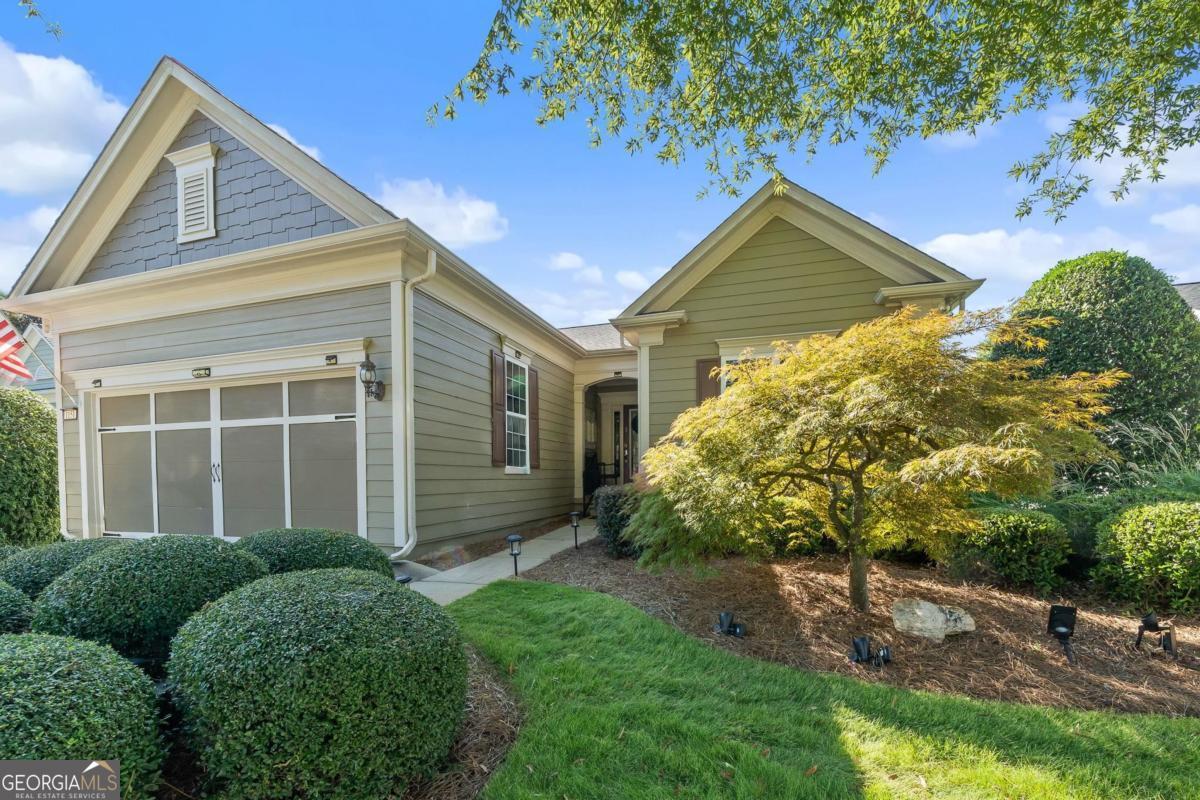 1151 Spring Station Road Greensboro, GA 30642 - Photo 6 of 60 a view of front of house with a yard