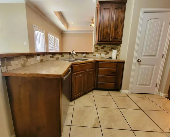 a bathroom with a sink vanity and a mirror