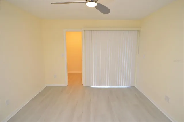 an aerial view of residential houses with outdoor space and river