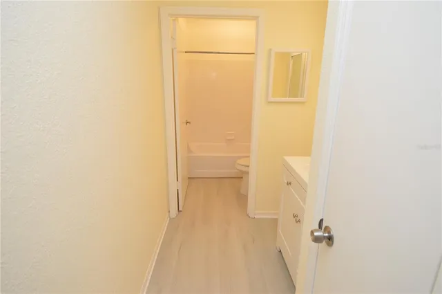 a view of a lobby with furniture and floor to ceiling window