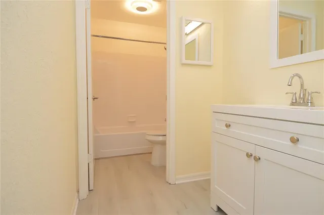 a view of a livingroom with furniture and a chandelier