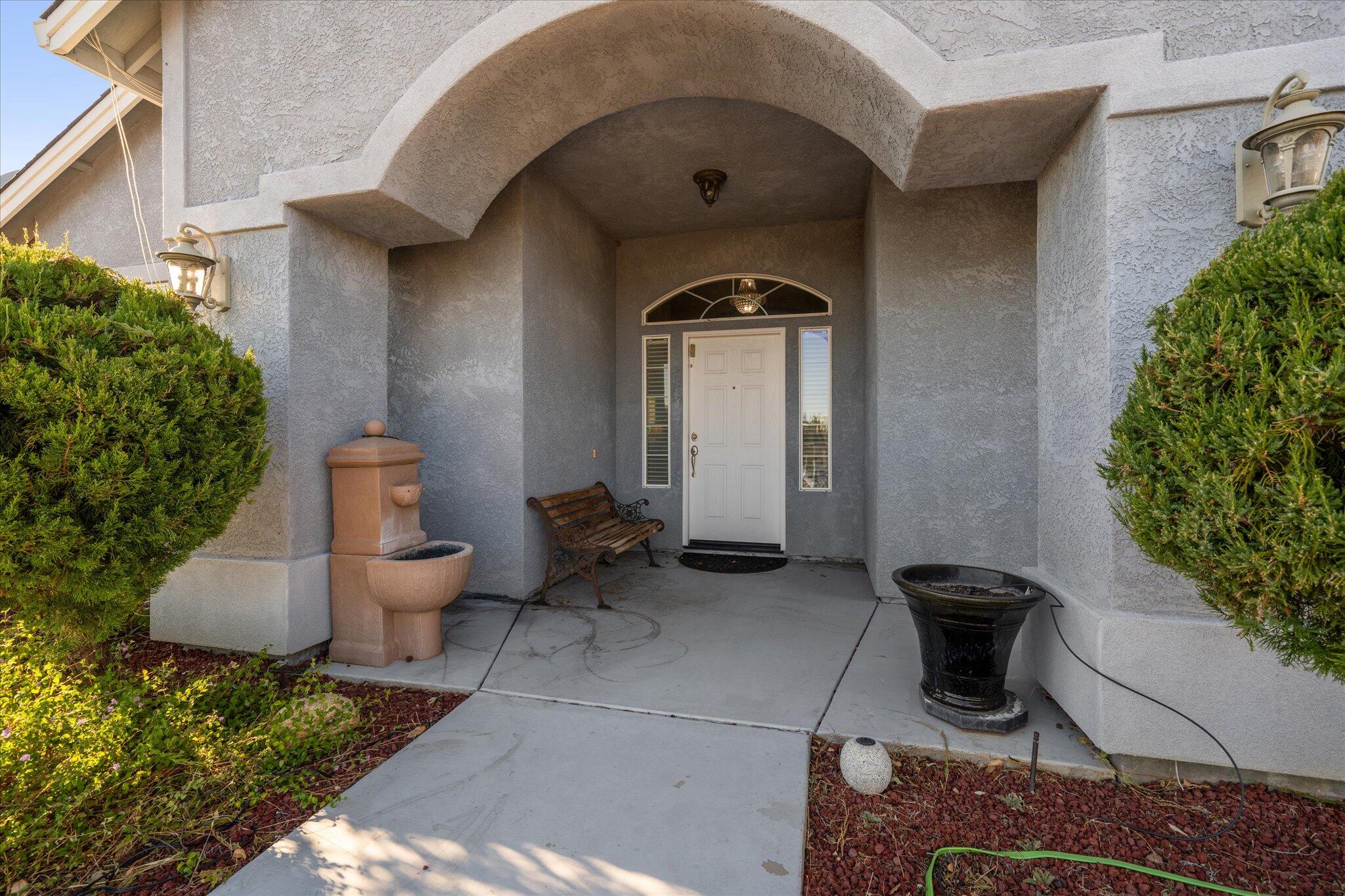 7870 Castle View Lane Redding, CA 96001 - Photo 3 of 65 a couple of potted plants in front of a door