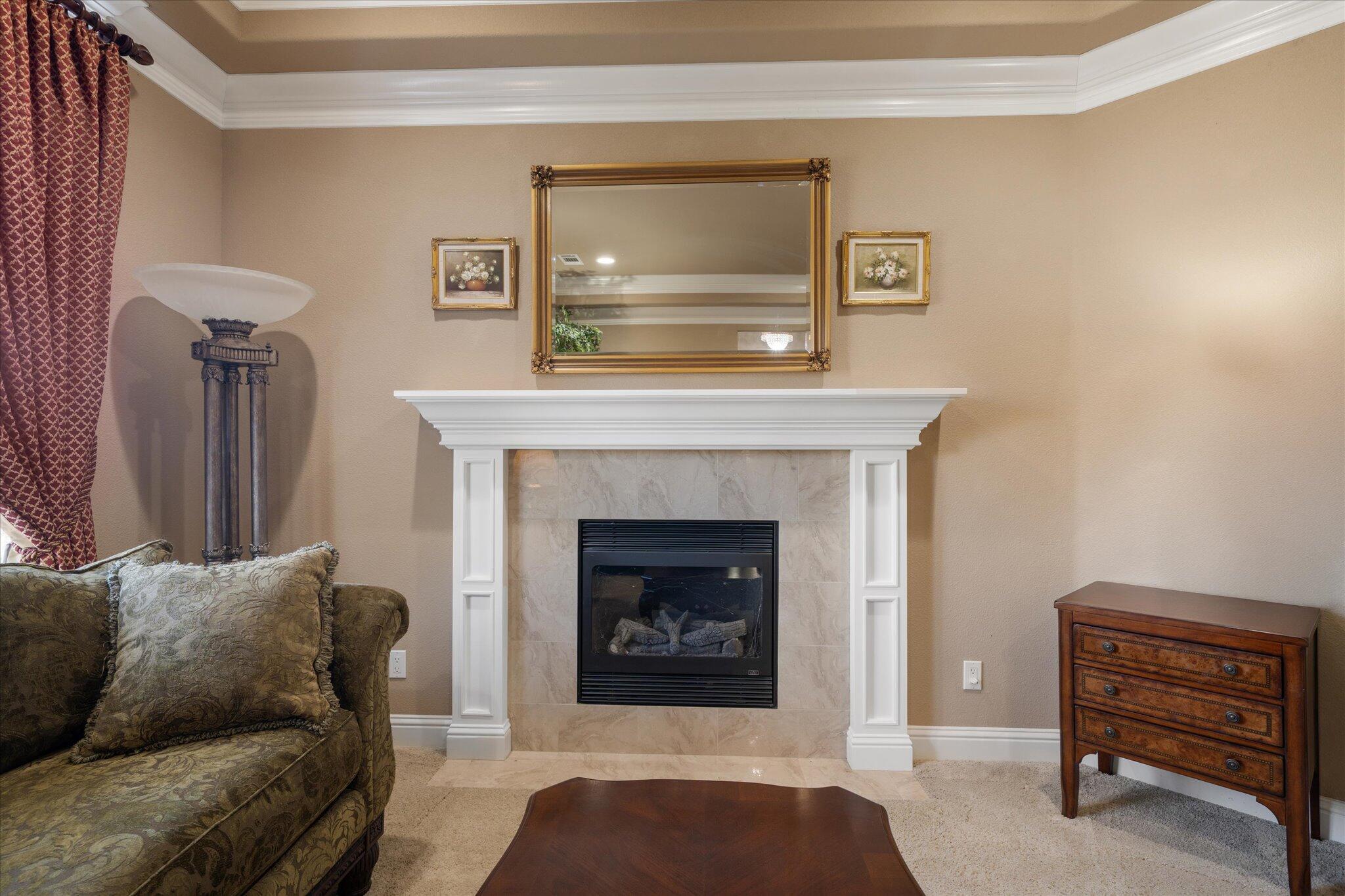 7870 Castle View Lane Redding, CA 96001 - Photo 5 of 65 a living room with furniture and a fireplace