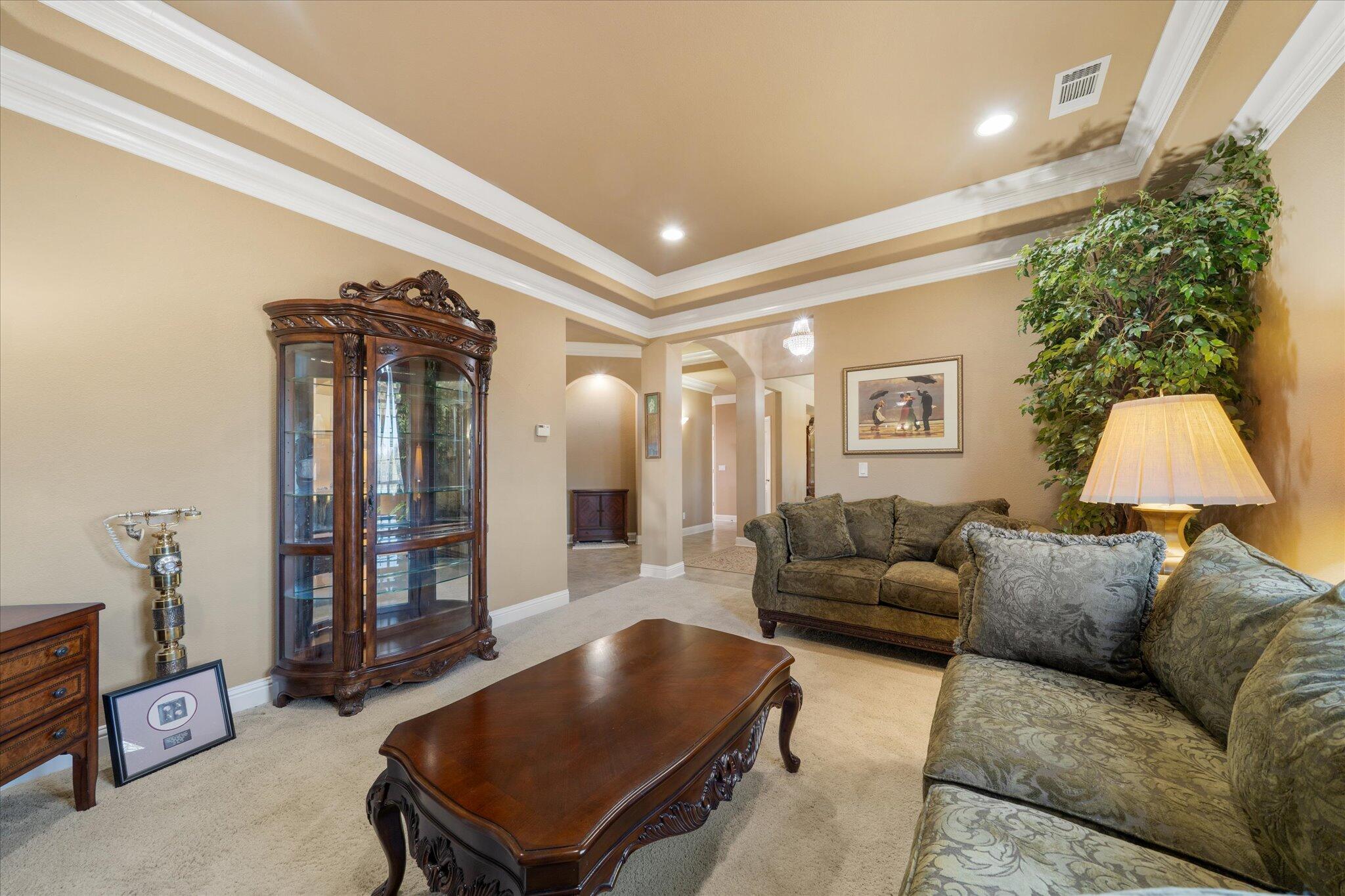 7870 Castle View Lane Redding, CA 96001 - Photo 6 of 65 a living room with furniture and a flat screen tv