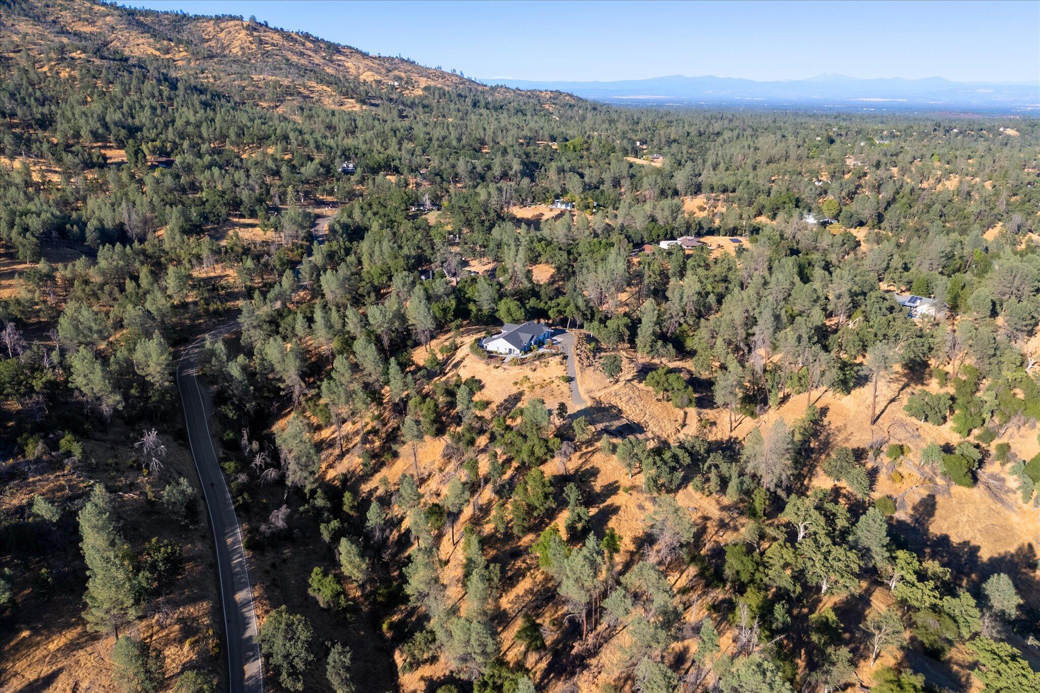 7870 Castle View Lane Redding, CA 96001 - Photo 62 of 65 a view of a city with an outdoor space