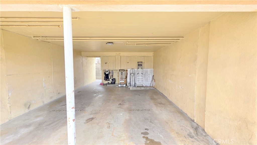 3733 Durfee Avenue, Unit 8 El Monte, CA 91732 - Photo 13 of 14 a view of a hallway with furniture and a window