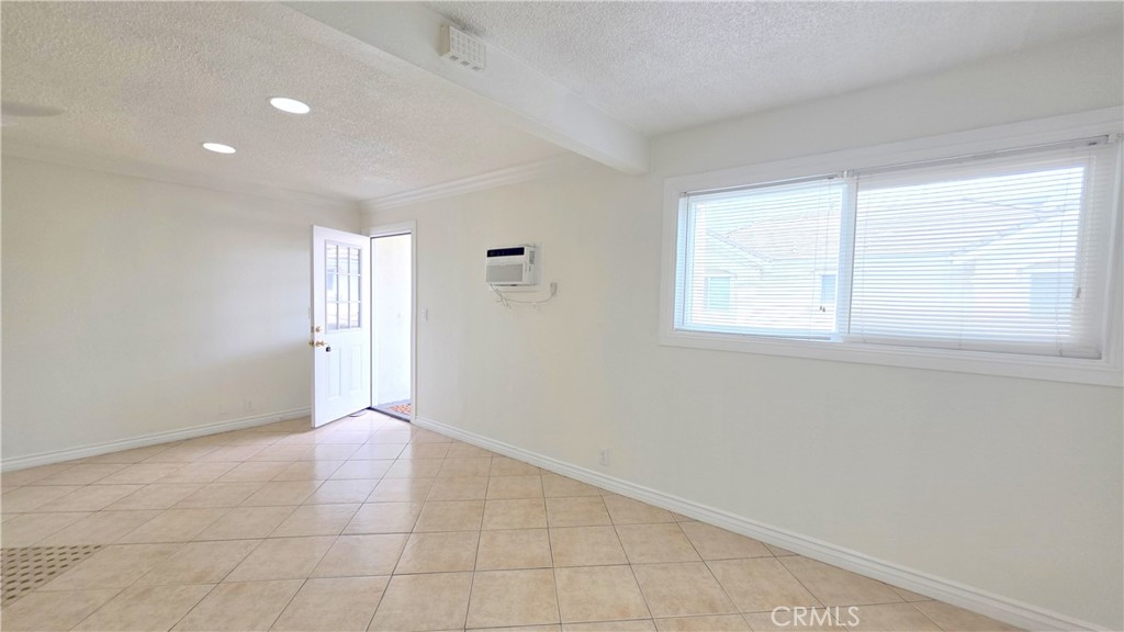 3733 Durfee Avenue, Unit 8 El Monte, CA 91732 - Photo 6 of 14 a view of an empty room with a window