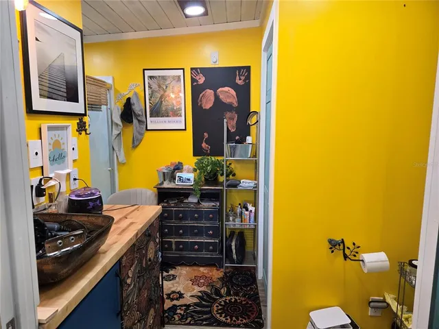 a view of a living room with a bathroom