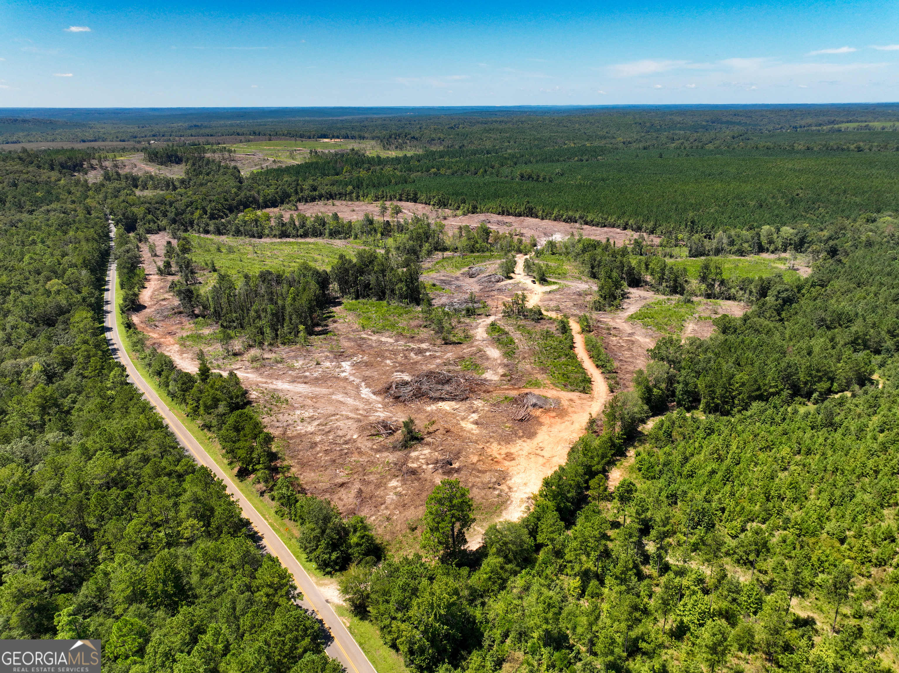 a view of a yard with an outdoor space