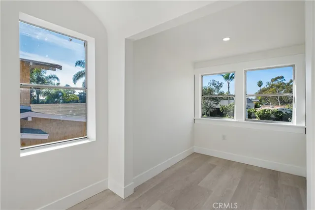 an empty room with windows