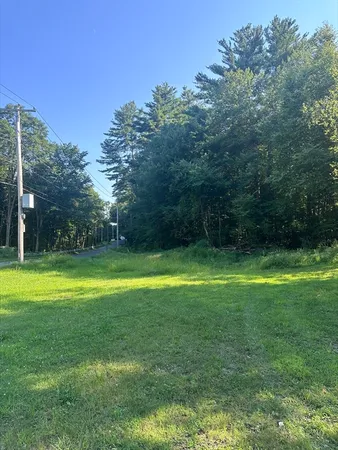 a view of a big yard with a small yard