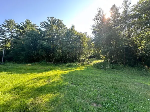 a view of a big yard with a small yard