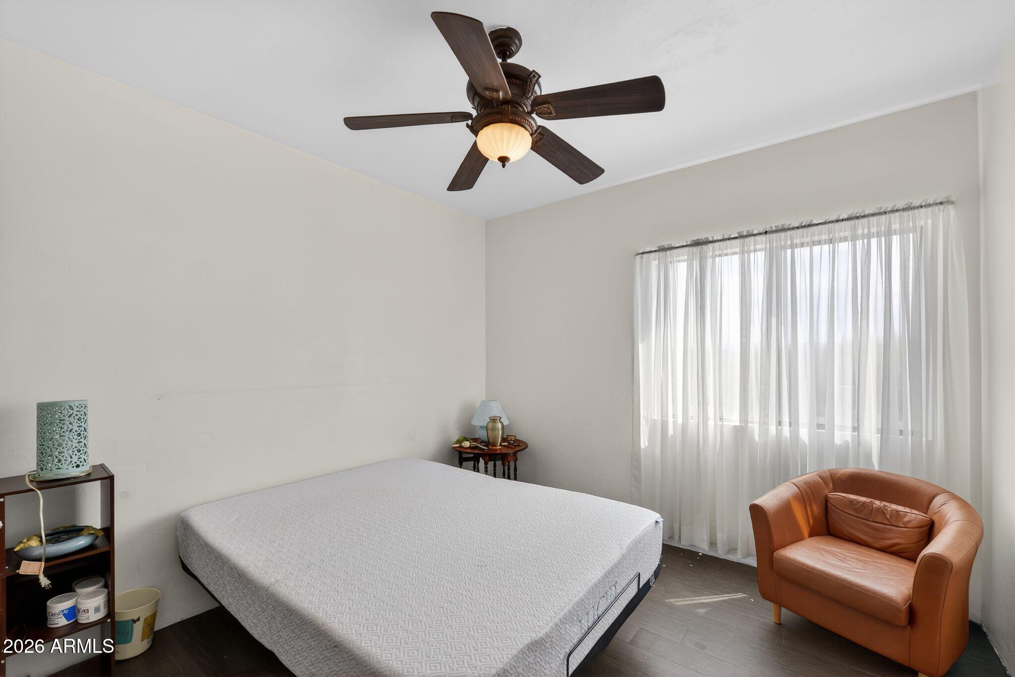 277 Círculo Silva Rio Rico, AZ 85648 - Photo 19 of 34 a room with a bed and a couch
