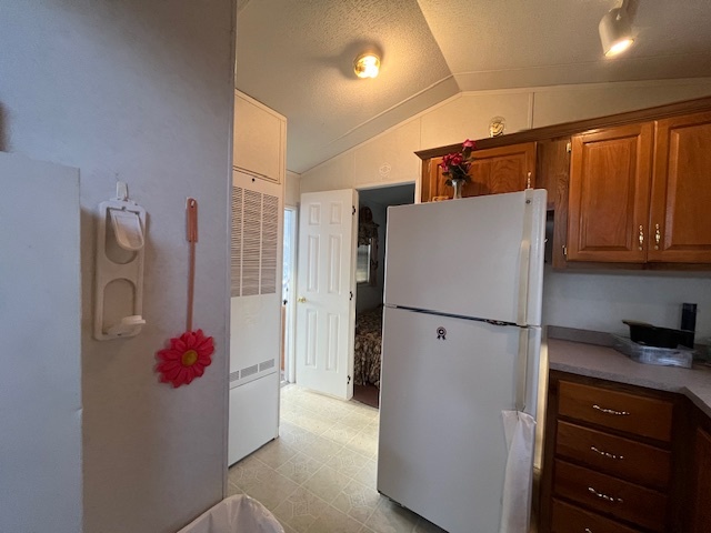 2795 East 28th Road Marseilles, IL 61341 - Photo 11 of 57 a white refrigerator freezer sitting in a kitchen