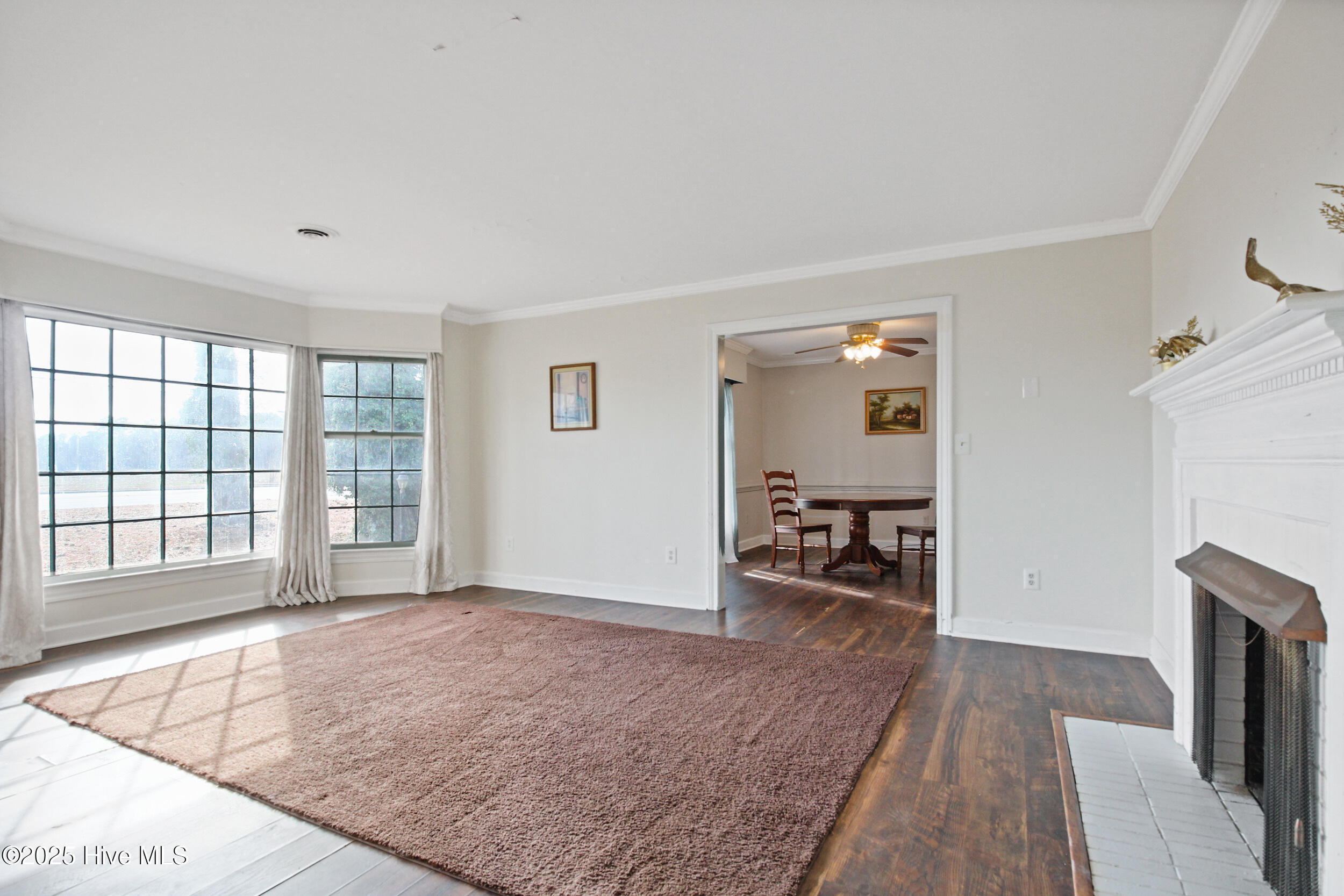 192 U.S. Highway 158 West Camden, NC 27921 - Photo 5 of 48 The gas see-through fireplace adds so much warmth and character