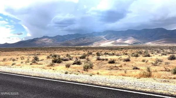 a view of mountain with lake view