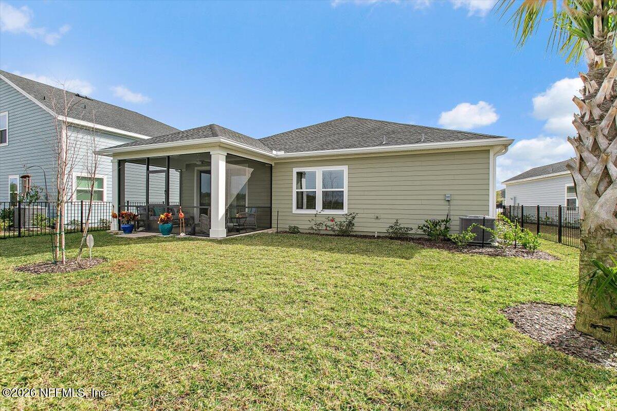 100 Simonson Run St. Augustine, FL 32092 - Photo 30 of 30 a front view of a house with garden