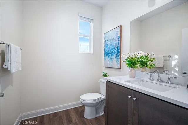 a view of backyard with wheel chair and potted plants