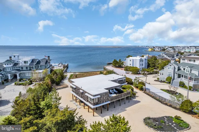 an aerial view of a house with a garden
