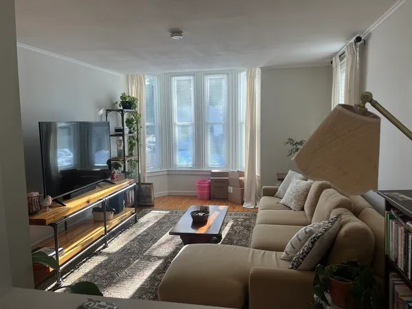 a living room with furniture and a couch