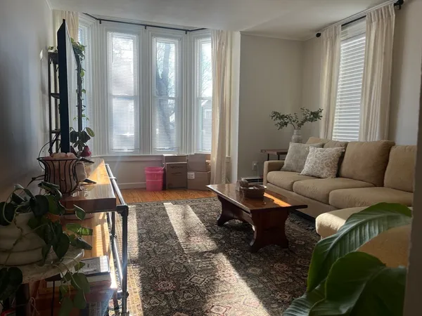 a room with window and couch