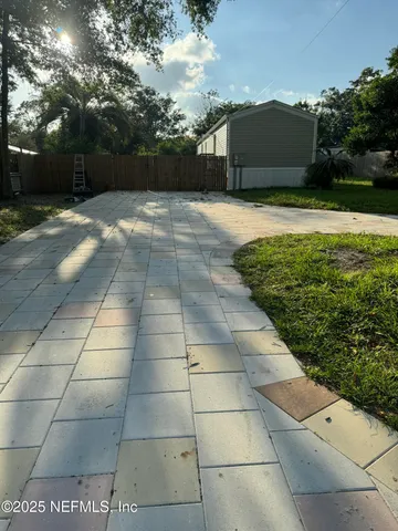 a view of a backyard with a garden