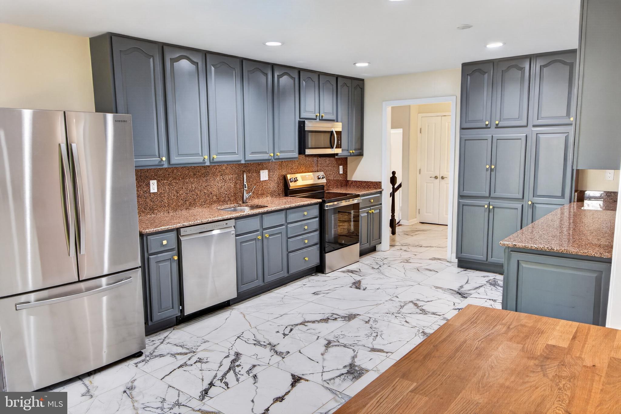 16 Redding Ridge Drive Gaithersburg, MD 20878 - Photo 40 of 53 Modern kitchen with elegant finishes.