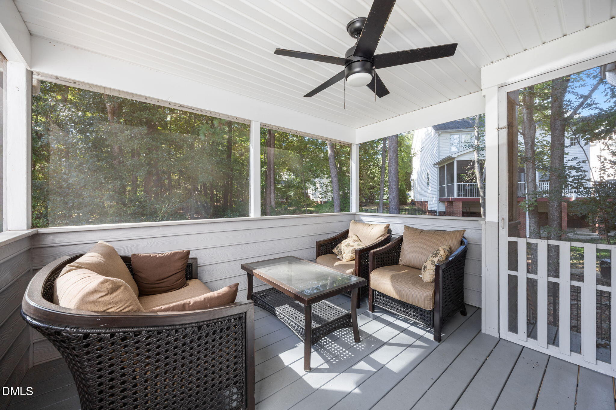 1758 Rowsby Court Wake Forest, NC 27587 - Photo 18 of 48 a living room with furniture and a floor to ceiling window