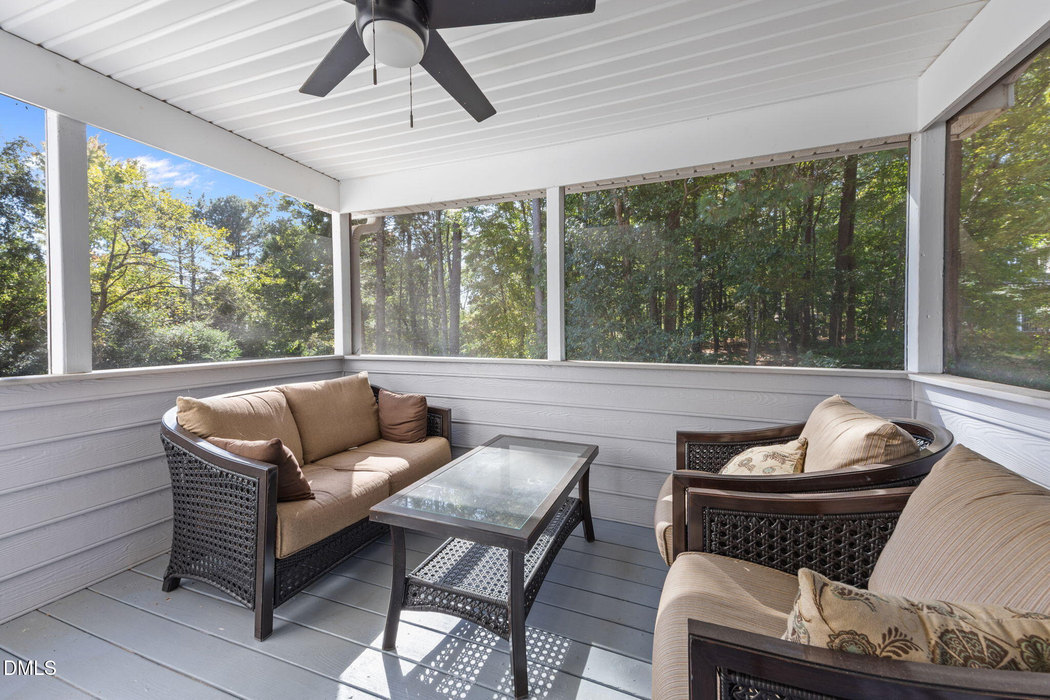 1758 Rowsby Court Wake Forest, NC 27587 - Photo 19 of 48 a living room with furniture and a floor to ceiling window