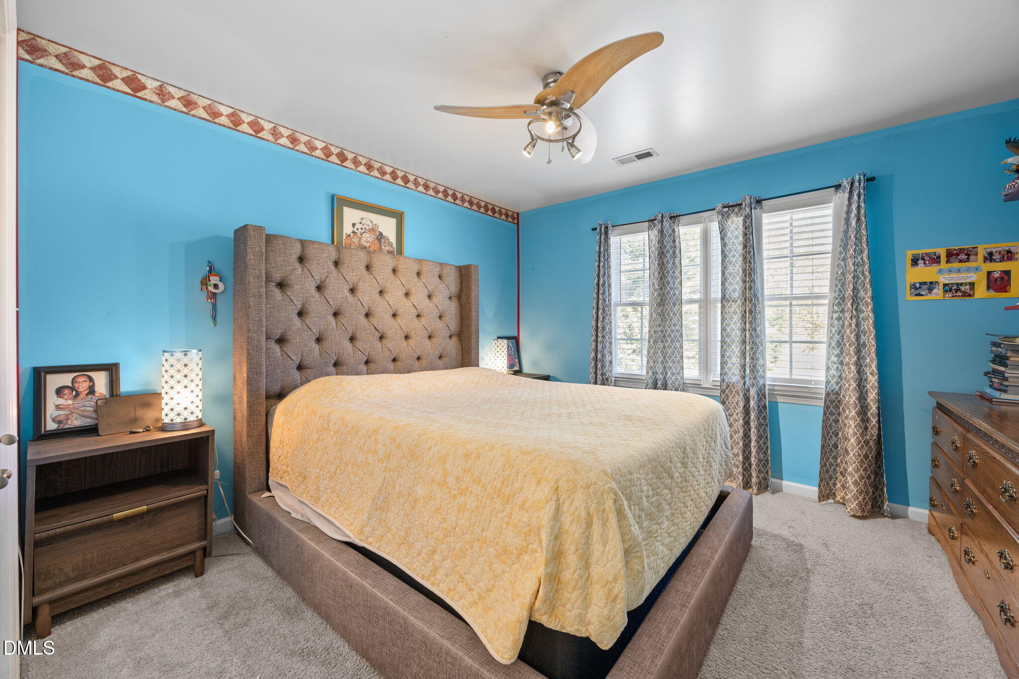1758 Rowsby Court Wake Forest, NC 27587 - Photo 27 of 48 a large bed sitting in a bedroom next to a window