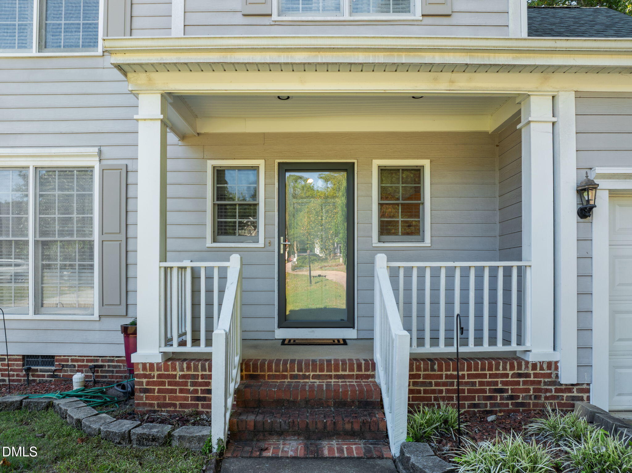 1758 Rowsby Court Wake Forest, NC 27587 - Photo 2 of 48 a view of a house with porch and wooden floor