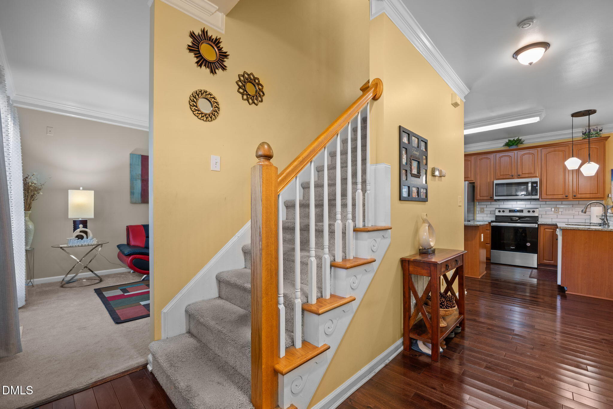 1758 Rowsby Court Wake Forest, NC 27587 - Photo 3 of 48 a view of a hallway with furniture and a floor to ceiling window