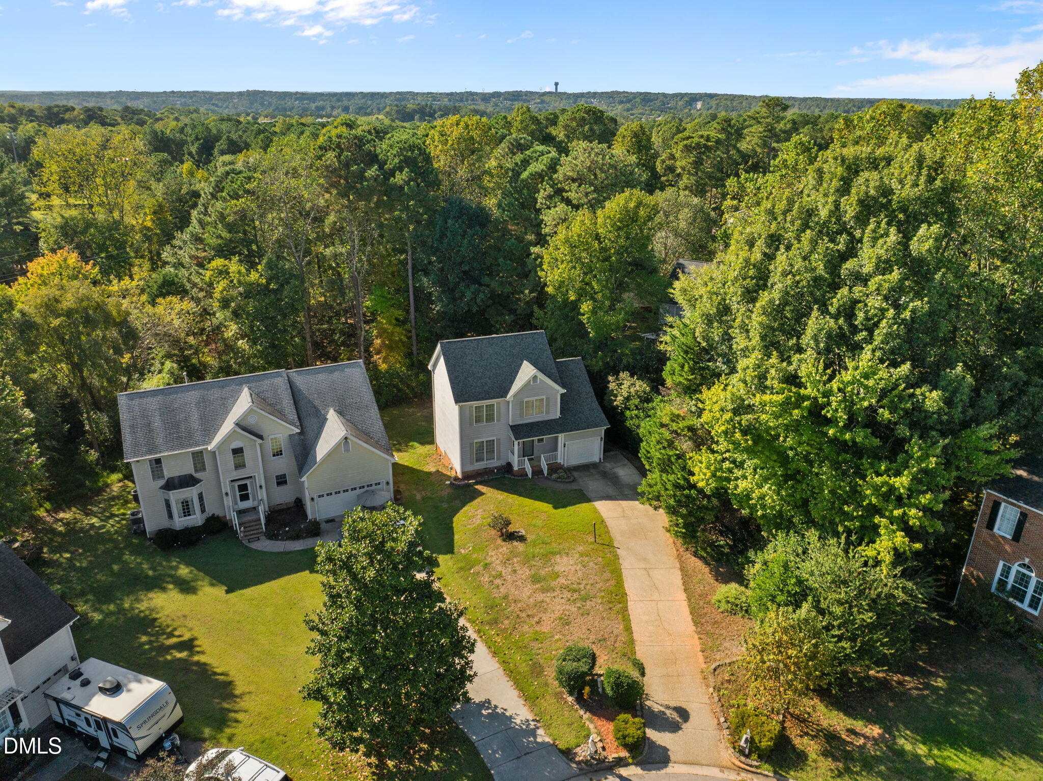1758 Rowsby Court Wake Forest, NC 27587 - Photo 44 of 48 an aerial view of a house with garden space and a swimming pool