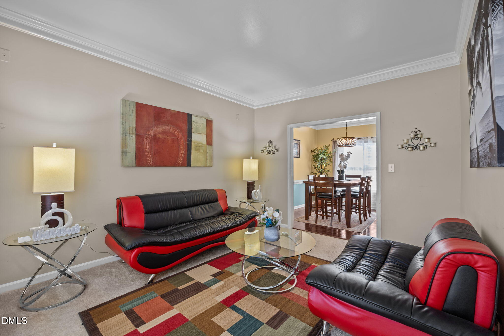 1758 Rowsby Court Wake Forest, NC 27587 - Photo 4 of 48 a living room with furniture and a dining table