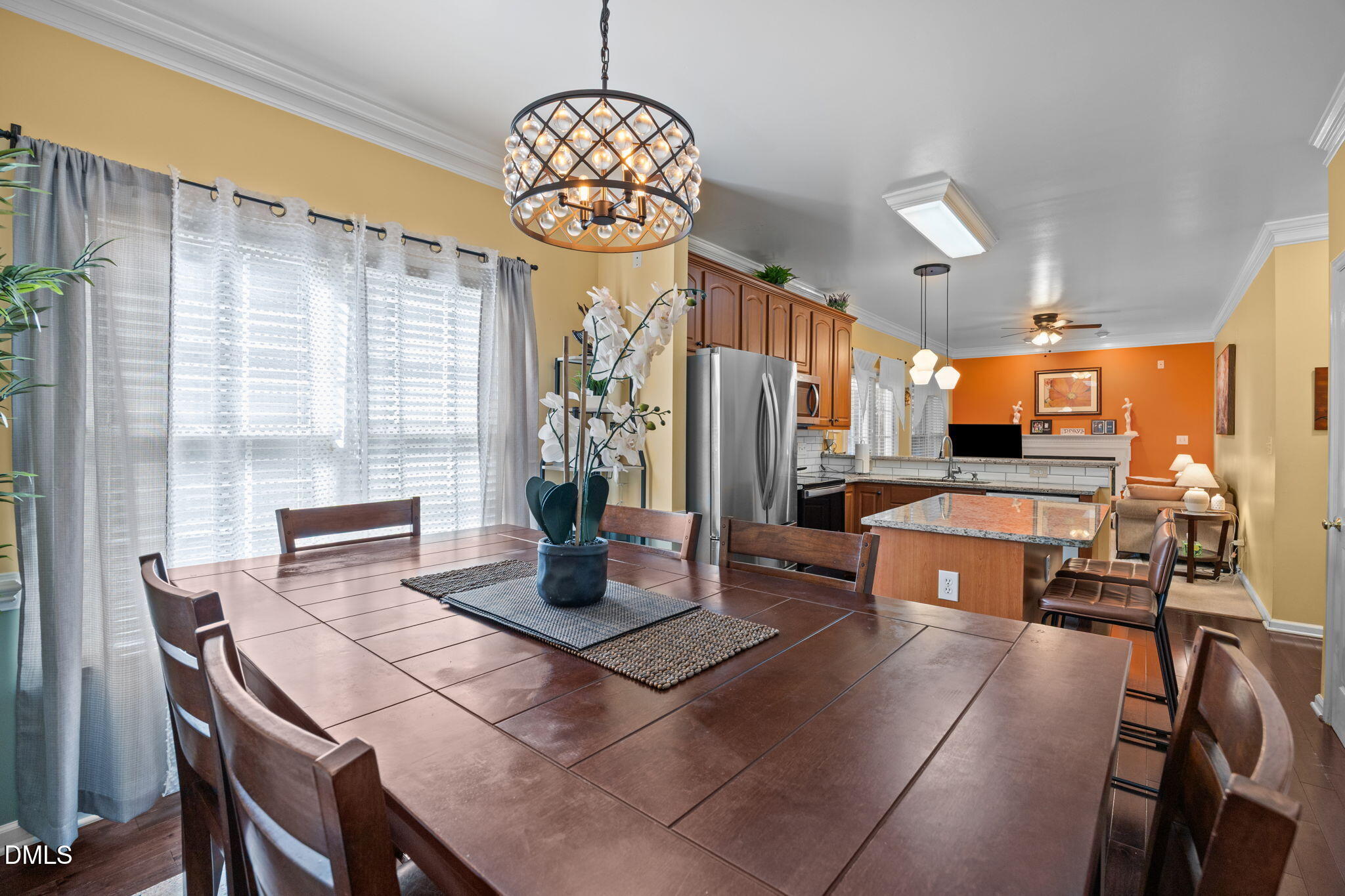 1758 Rowsby Court Wake Forest, NC 27587 - Photo 8 of 48 a view of a dining room with furniture window and wooden floor