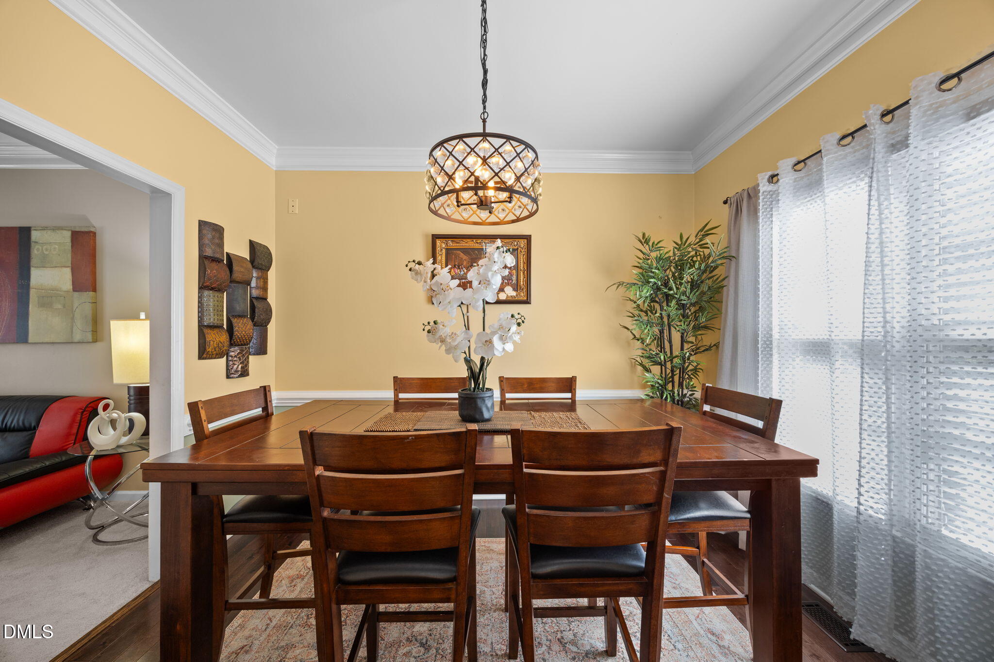 1758 Rowsby Court Wake Forest, NC 27587 - Photo 9 of 48 a view of a dining room with furniture window and wooden floor