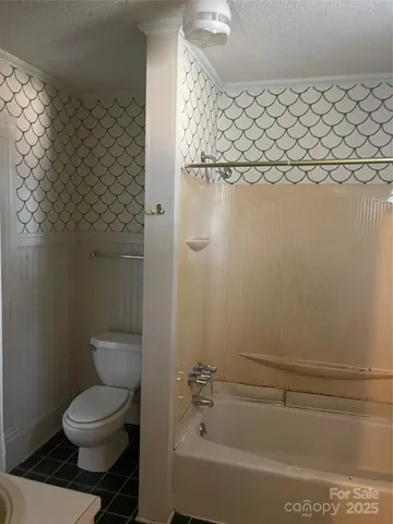 a bathroom with a sink and shower