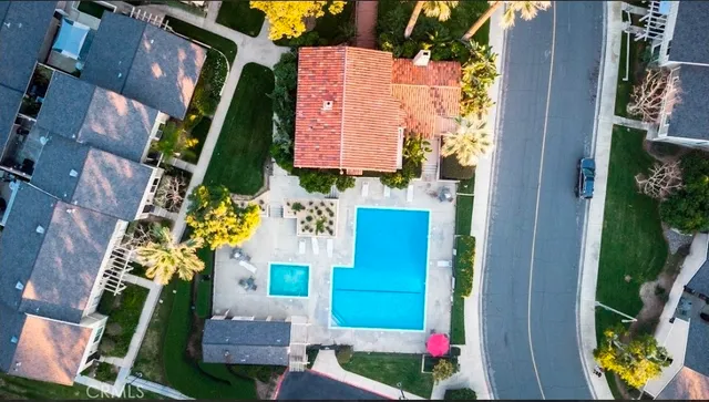 a front view of a house with a yard and outdoor seating
