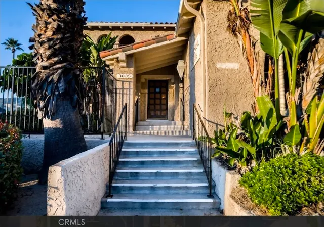 a view of a building with a garden