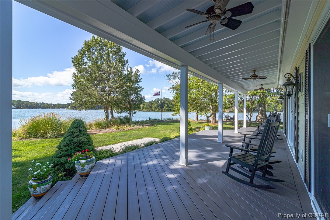 192 Bayberry Point Lane Kilmarnock, VA 22482 - Photo 14 of 49 Wooden terrace with a yard, a water view, and ceiling fan