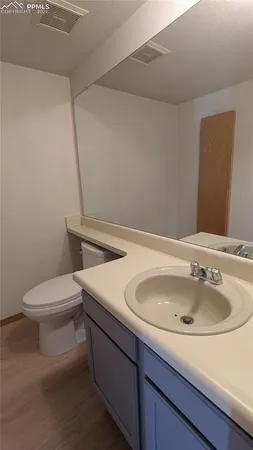 a bathroom with a sink and a toilet