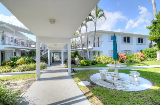 a view of a playground with a patio