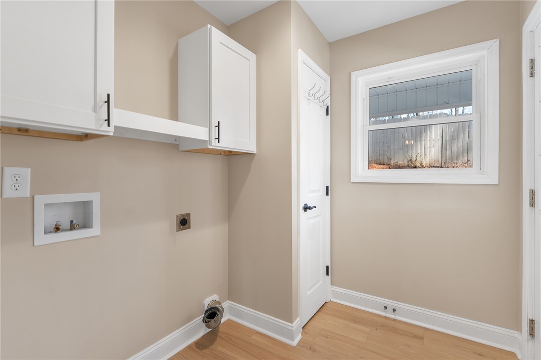505 Hillside Drive Walhalla, SC 29691 - Photo 14 of 31 This dedicated laundry space offers practical convenience for daily chores.