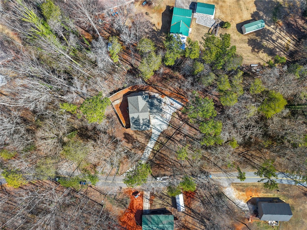505 Hillside Drive Walhalla, SC 29691 - Photo 27 of 31 An aerial view showcases a residential property nestled amongst natural landscaping and mature trees.