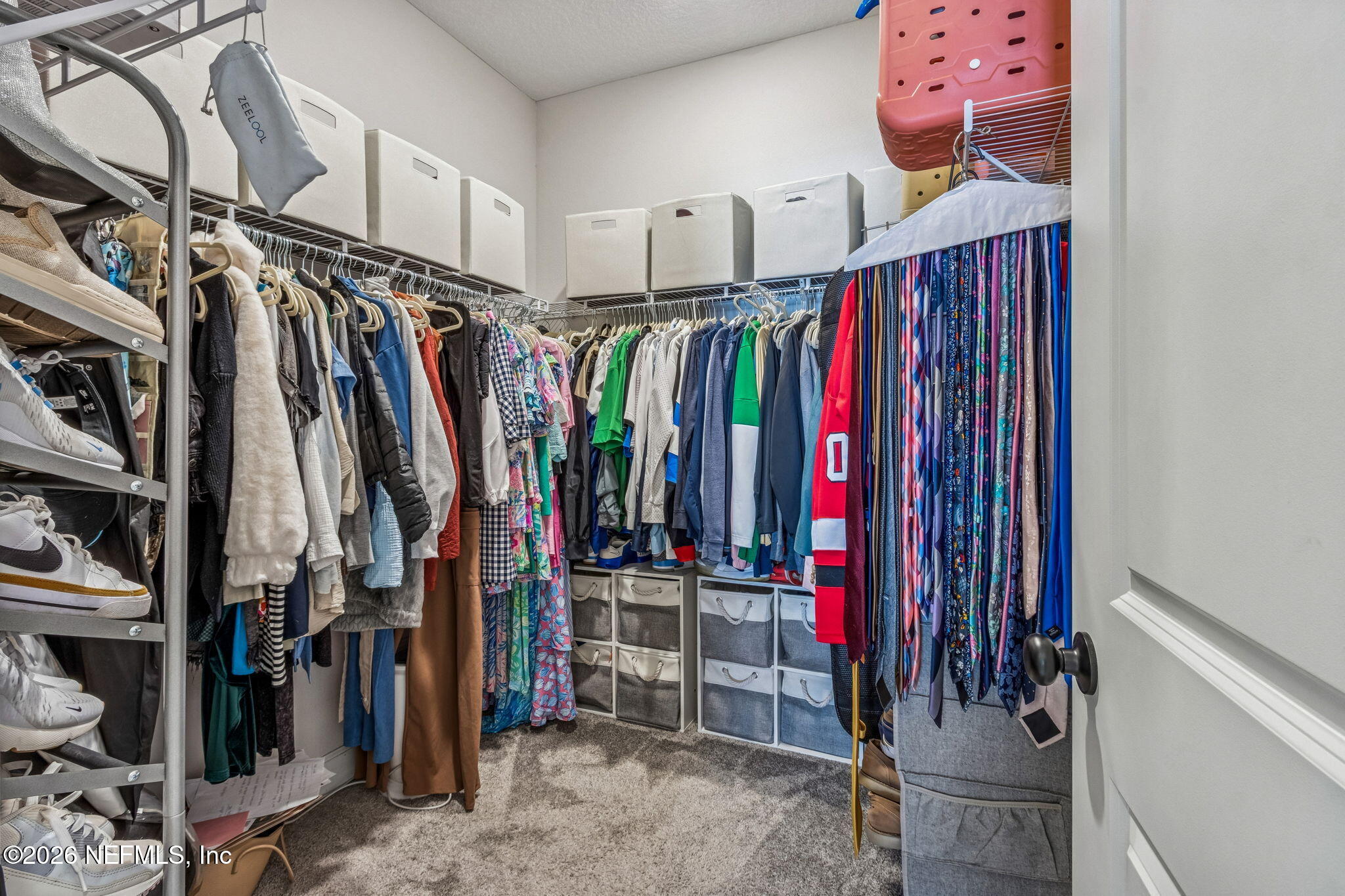 95057 Terris Way Fernandina Beach, FL 32034 - Photo 22 of 43 a view of walk in closet with clothes