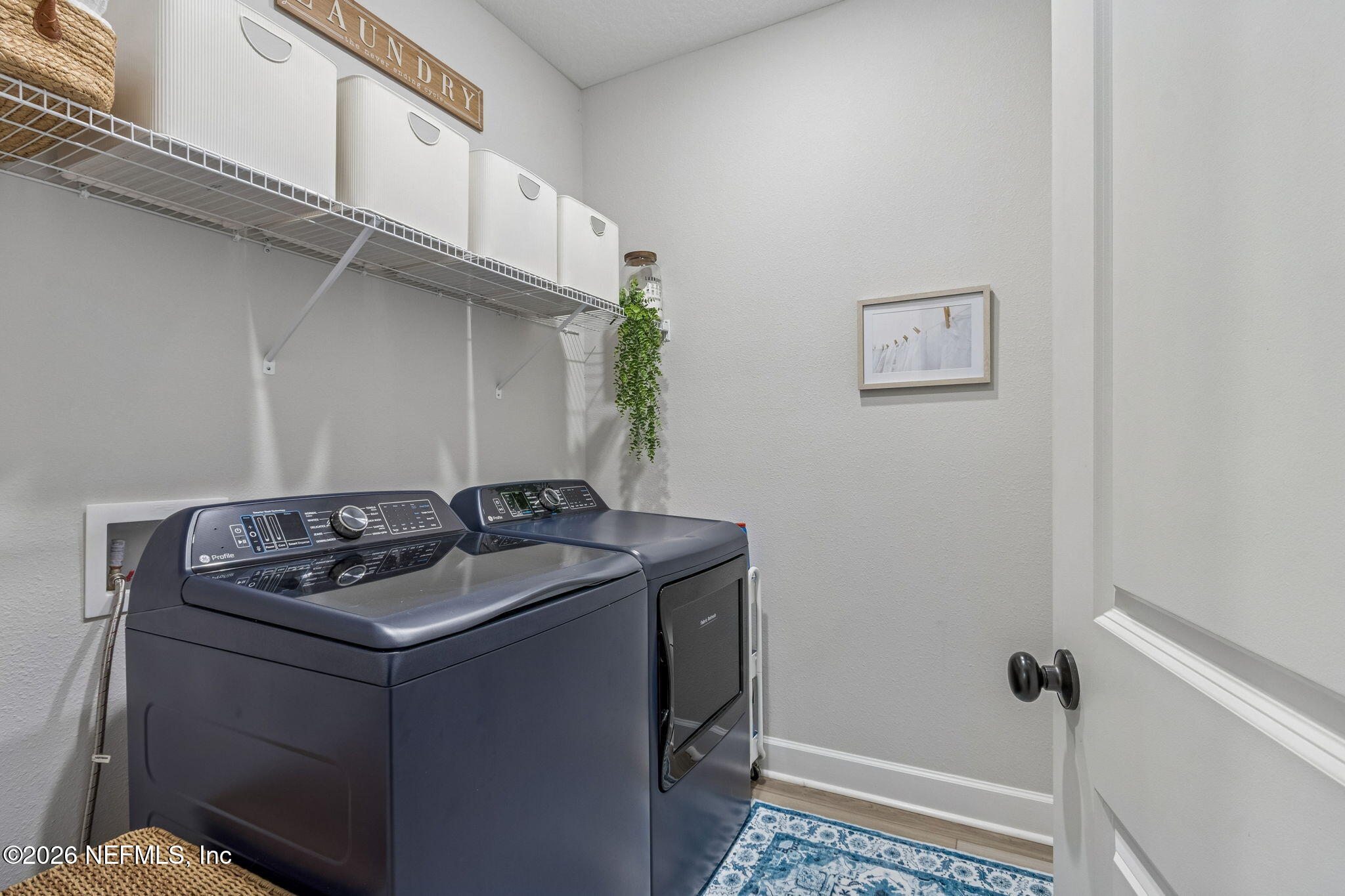 95057 Terris Way Fernandina Beach, FL 32034 - Photo 26 of 43 a utility room with dryer and washer